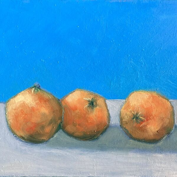 Satsumas on Blue