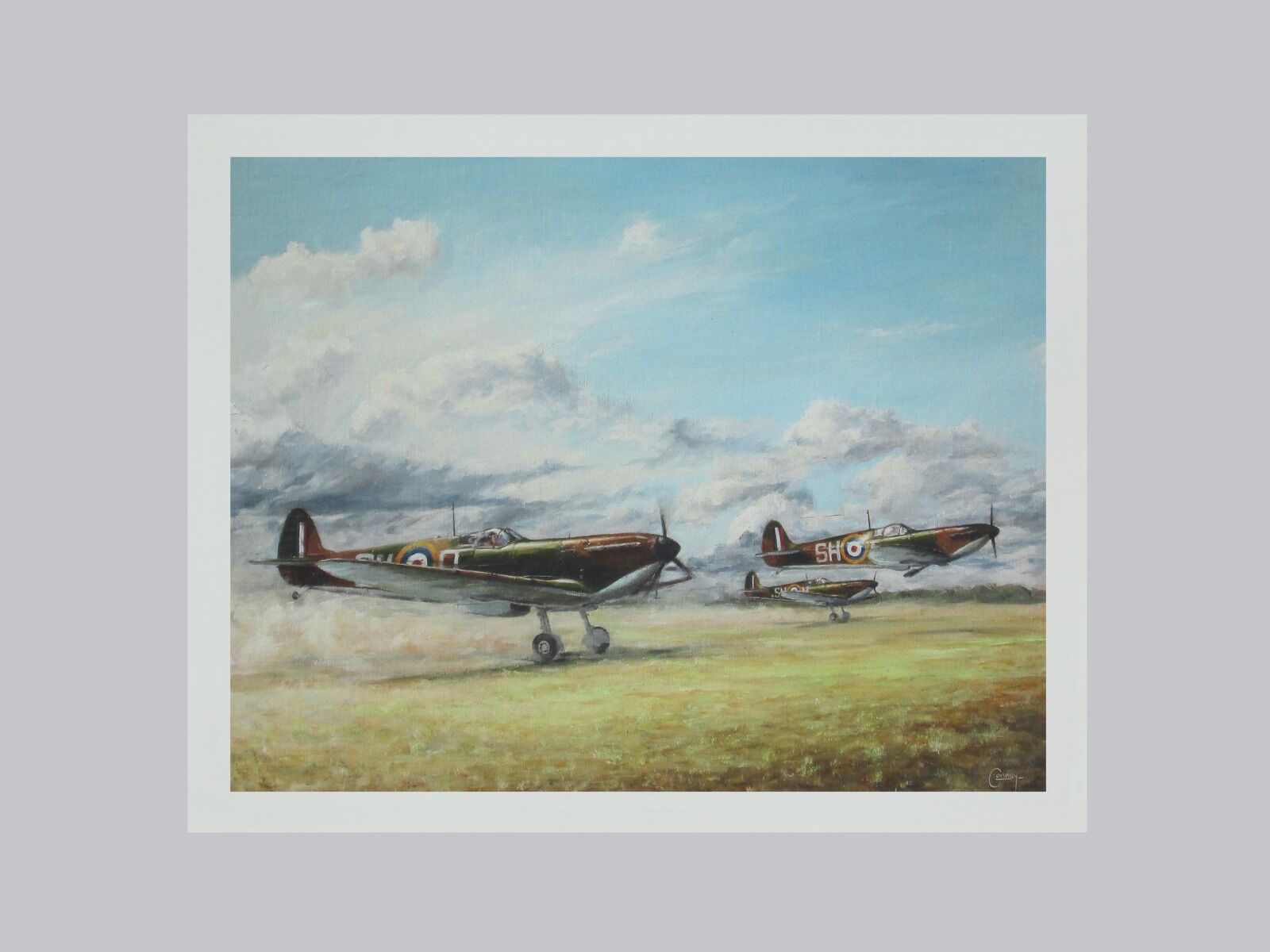 A.R. D. MacDonnell's Spitfire taking off with two other Spitfires on a dusty airfield at Kenley.
