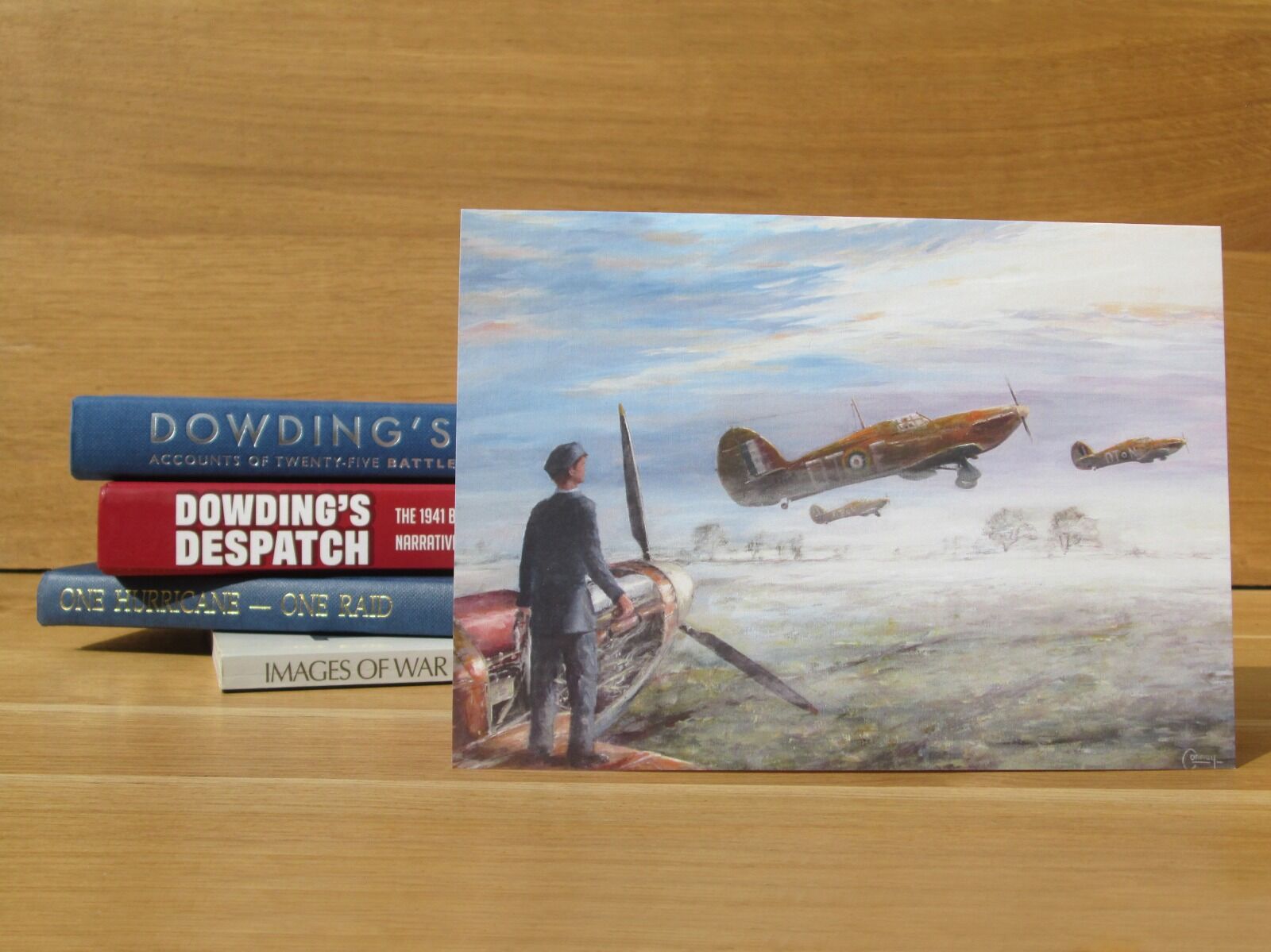 Hurricanes taking off in mist with RAF personnel in foreground