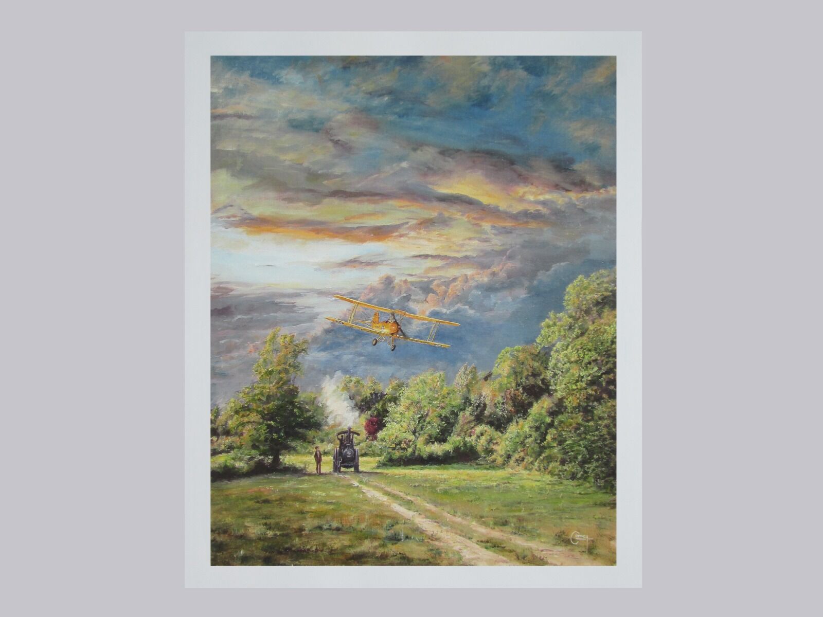 Painting of a Tiger Moth aircraft flying low over an Aveling and Porter Traction engine at sunset in a field with trees in background.