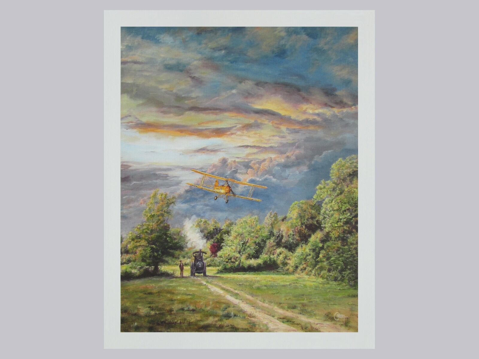 Painting of a Tiger Moth aircraft flying low over an Aveling and Porter Traction engine at sunset in a field with trees in background.