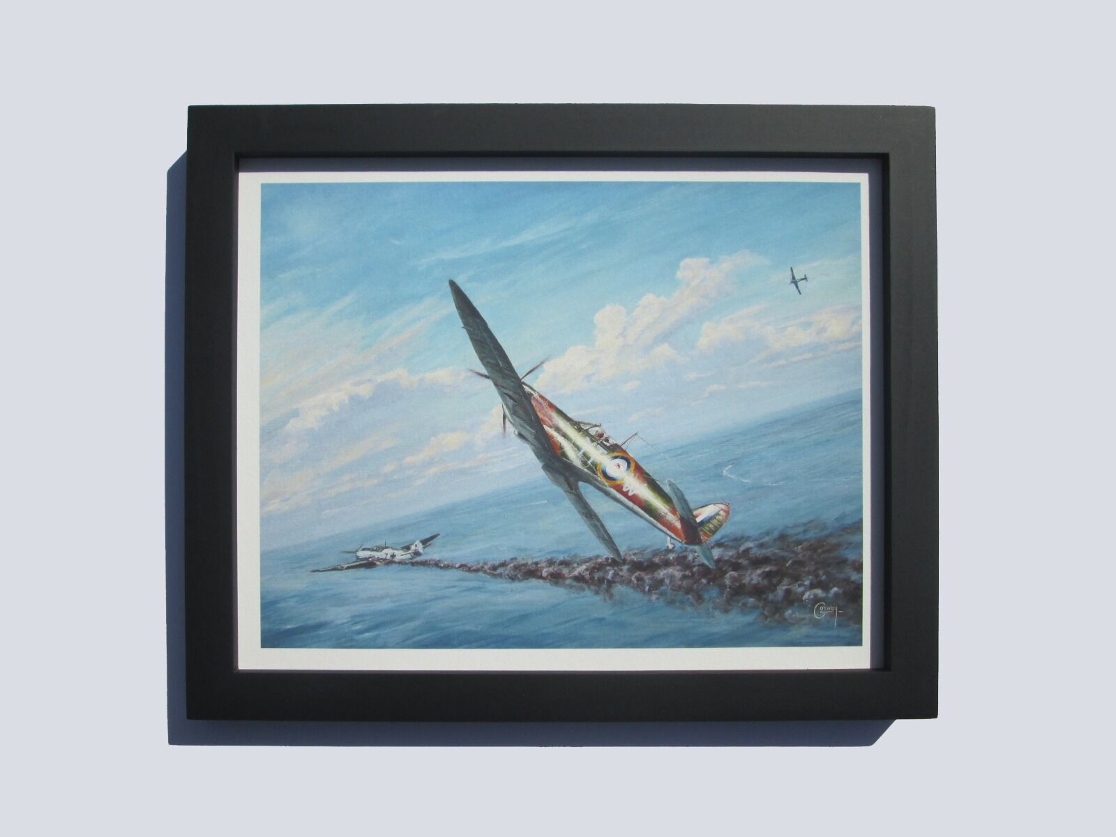 Painting of Paddy Finucane's Spitfire chasing a damaged Me 109 over the sea