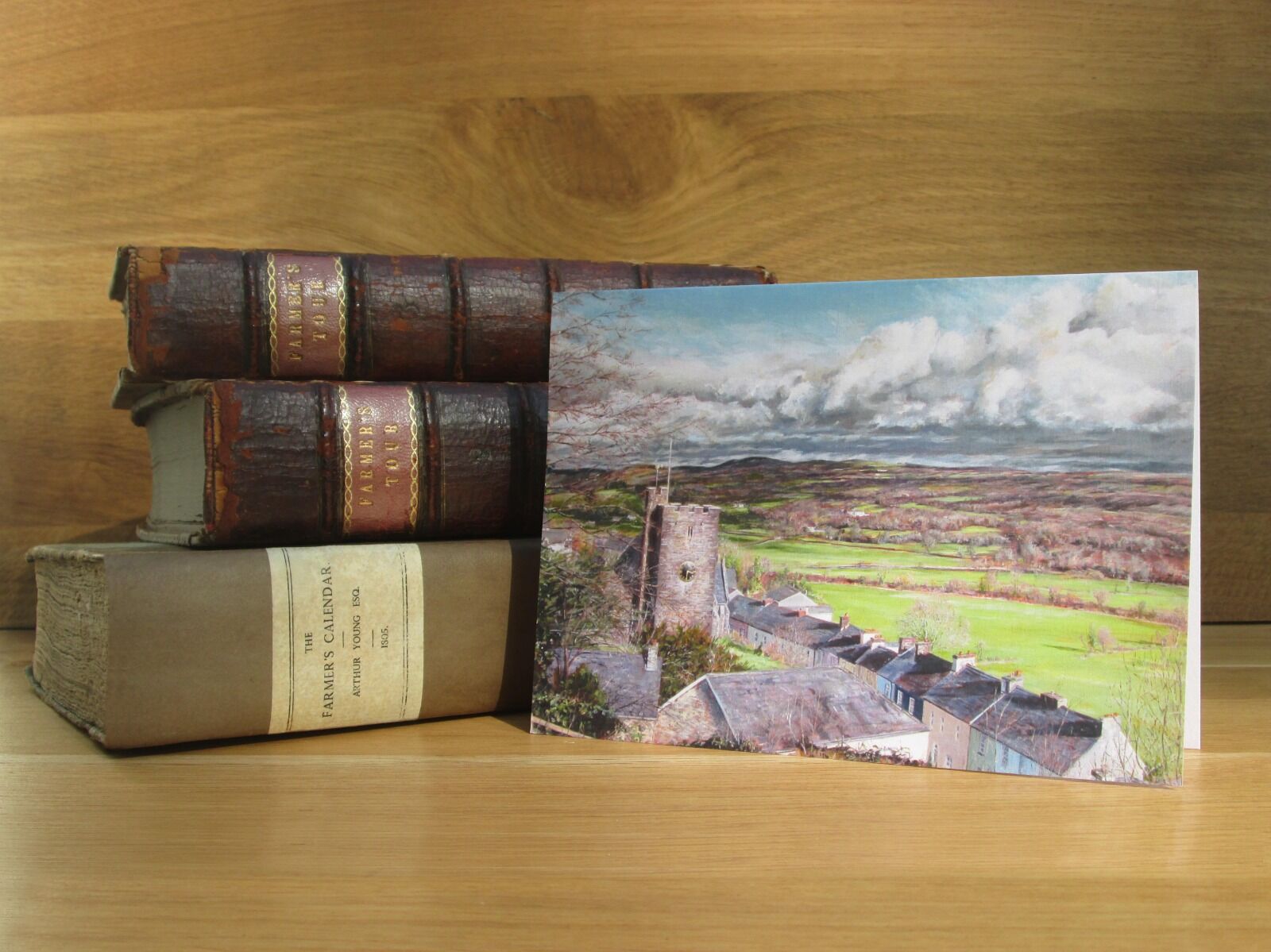 Painting of view over Llandeilo with Church tower.