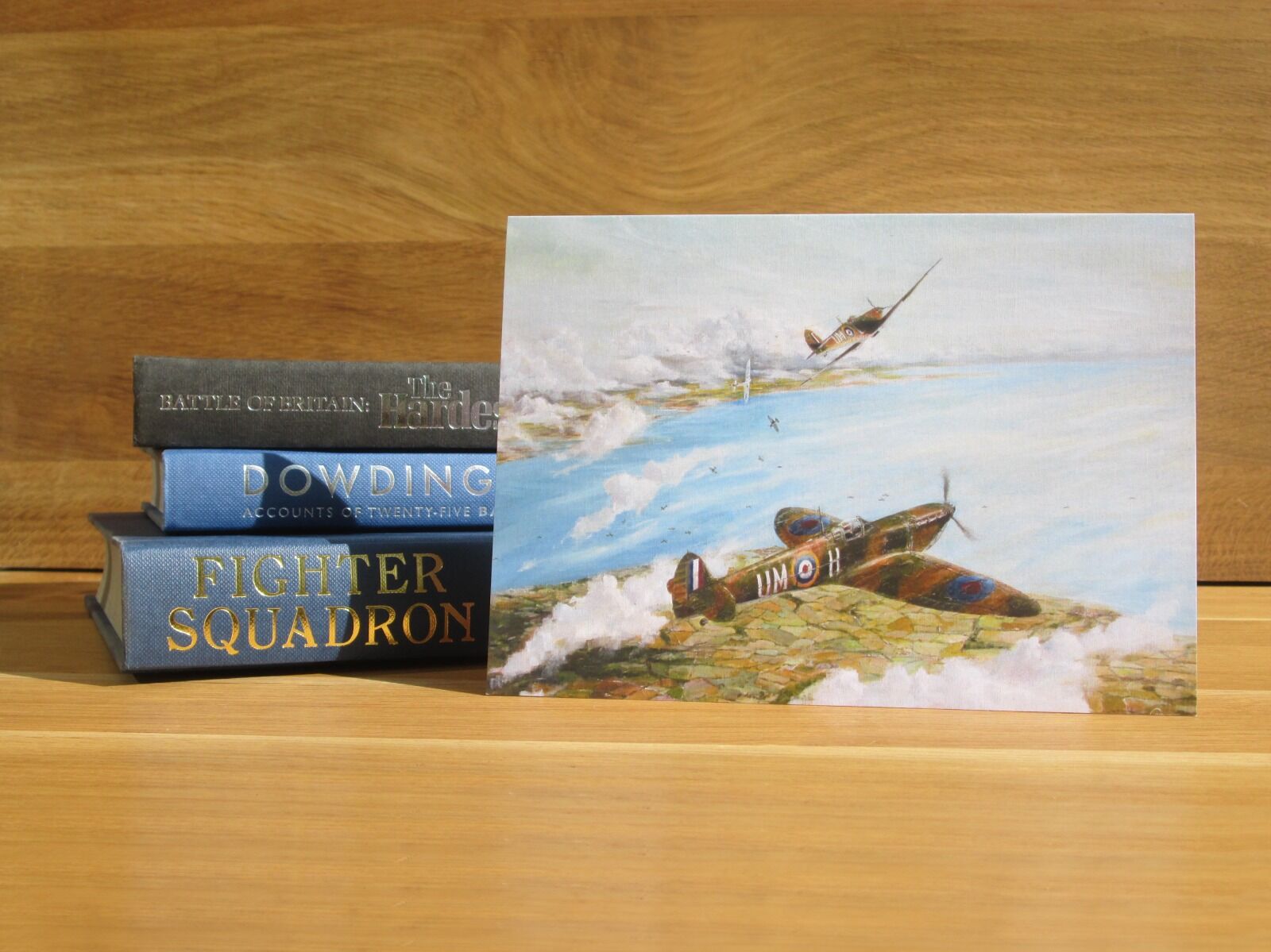 Painting of Spitfires breaking into combat over the Isle of Wight.