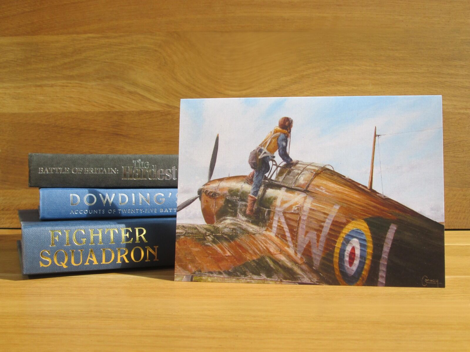 Painting of a pilot climbing into a Hurricane during the Battle of Britain.