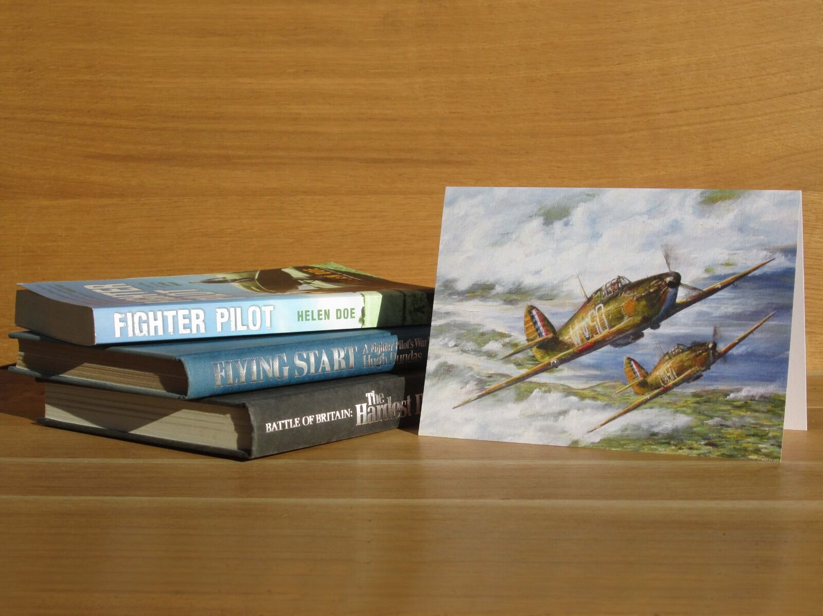 Painting of two Hurricanes climbing over the Thames Estuary.