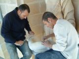 Workers restoring one of the niche statues, Zebbug parish church