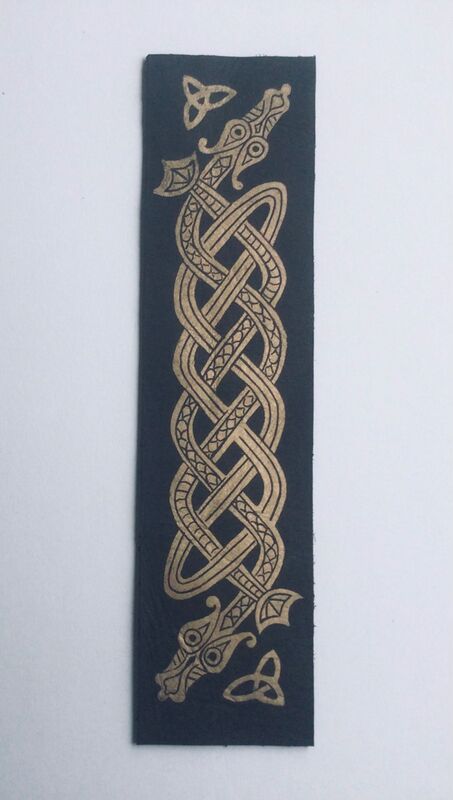 Linocut print on leather Celtic dragon
