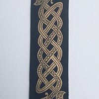 Linocut print on leather Celtic dragon