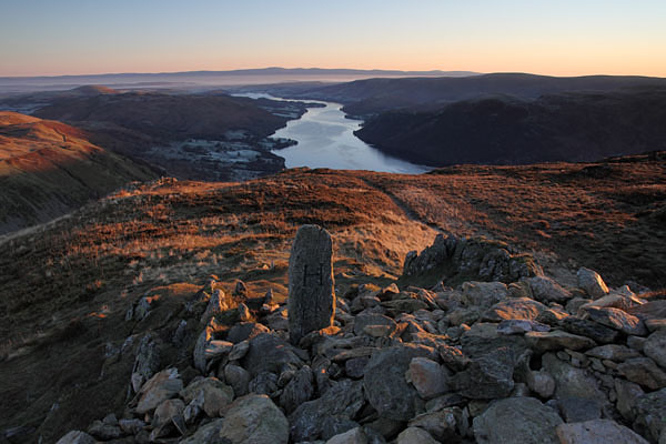 04D-0067 Boundary Stone on the Summit of Sheffield Pike at Dawn with Ullswater and the Distant Pennines, Lake District Cumbria UK