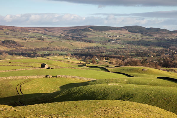 04D-1715 The View from the Ancient Hilltop Tumulus of Kirkcarrion North East Across the Farmland of the Tees Valley Towards Stobgreen Plantation Teesdale County Durham UK