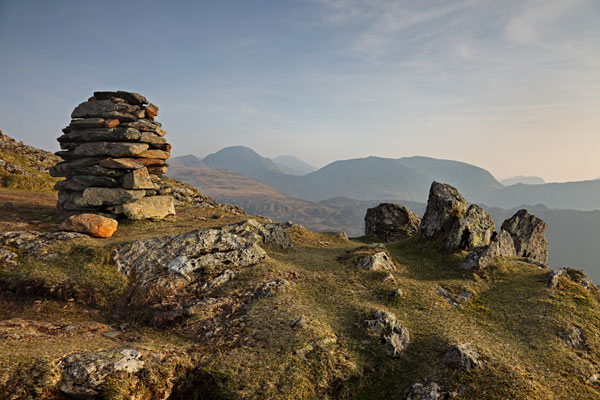 04D-5001 The Summit of Fleetwith Pike and the View South Towards the Mountains Of Great Gable and Kirk Fell in Misty Late Evening Light Lake District Cumbria UK