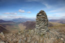 04D-7381 The Summit Cairn of Dale Head and the View Down the Newlands Valley Towards the Mountain of Skiddaw Lake District Cumbria UK