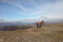 04D-7444 Two Walkers on the Summit of Dale Head and the View Over High Spy and Maiden Moor Towards Blencathra Lake District Cumbria UK.