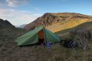 04D-7844 Lightweight Backpacking Tent on the Lower Slopes of Dale Head with the Mountain of High Spy Behind Lake District Cumbria UK