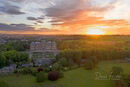 The summer solstice sun rises over the spectacular French style chateau of the Bowes Museum in Barnard Castle