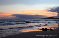 Sunset at Puerto Villamil beach