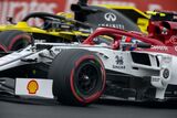 Antonio Giovinazzi in the Alfa Romeo with Nico Hulkenberg in the background @ Silvestone 2019