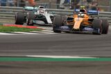 Lando Norris at Copse corner followed by Lewis Hamilton @Silverstone 2019