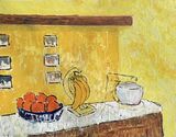 Bananas and oranges in the kitchen.
