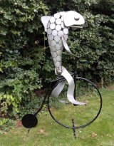 Fish on a Penny Farthing