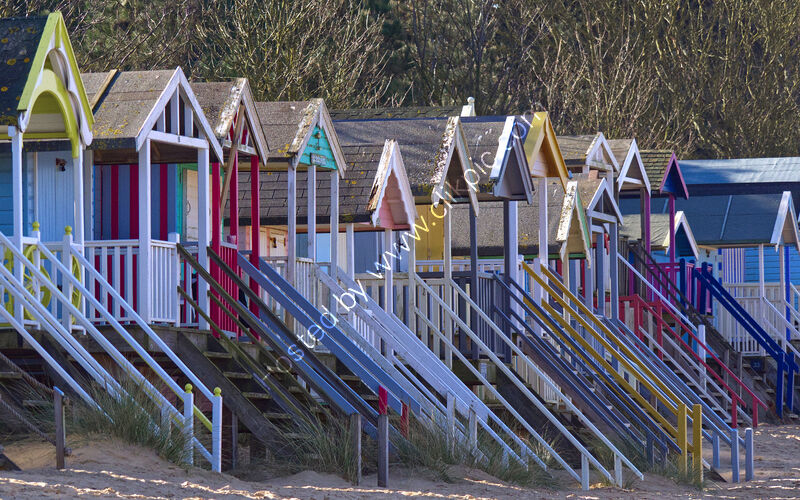 BEACH HUTS AT WELLS by Phil Robinson