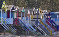 BEACH HUTS AT WELLS by Phil Robinson