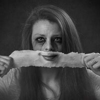 BEHIND THE SMILE by Liva Paseka