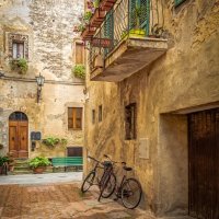 BICYCLES IN PIENZA by Mike Arblaster