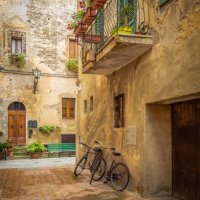 BICYCLES IN PIENZA by Mike Arblaster