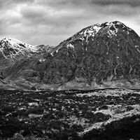 BLACK ROCK COTTAGE AND MOUNTAIN FROM DISTANCE by Stanley J Annable