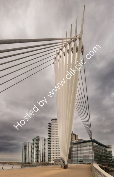 CROSSING THE BRIDGE AT SALFORD QUAYS by Christine Maughan