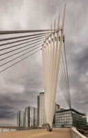 CROSSING THE BRIDGE AT SALFORD QUAYS by Christine Maughan