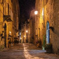 EVENING SHOWER PIENZA by Mike Arblaster
