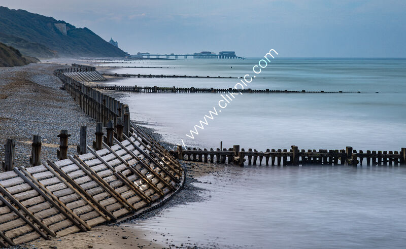 GROYNES AT OVERSTRAND NORFOLK by Mike Arblaster