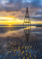 LAST LIGHT AT THE GROYNE BEACON by Ray Andrews
