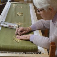 PAM AT HER EMBROIDERY FRAME by Gill Dishart