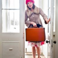 THE GIRL WITH THE SUITCASE