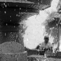 RAINING IN THE SQUARE by Simon Higginson