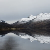 REFLECTED MOUNTAINS by Derrick Tuplin