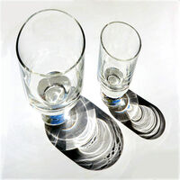 SIMPLE GLASSES COMPLEX SHADOWS by Sue Swain
