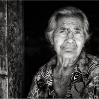 SLOW DAY - BALINESE STREETSELLER by Jim Connolly