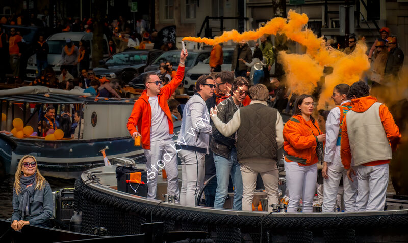 SPIRITED DUTCH YOUTH ON KINGS DAY by Tony Barker