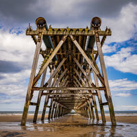 THE OLD MAGNESITE PIER by Ray Andrews