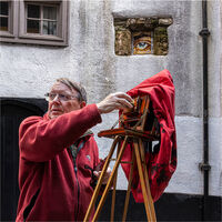 WATCHING A BRISTOL STREET PHOTOGRAPHER by David Harrison