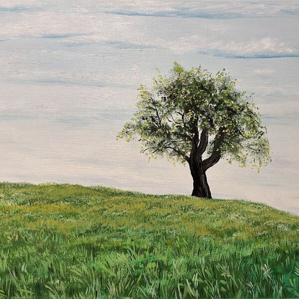Oil painting of a tree on a grassy bank