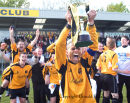 CHAMPIONS SONS RECEIVE TROPHY