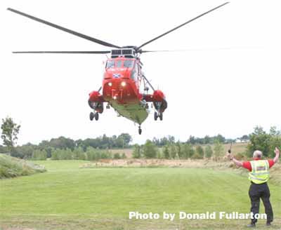 Royal Navy helicopter lands at Drymen