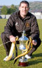 Dumbarton Football Club manager Jim Chapman with the Scottish third division trophy.