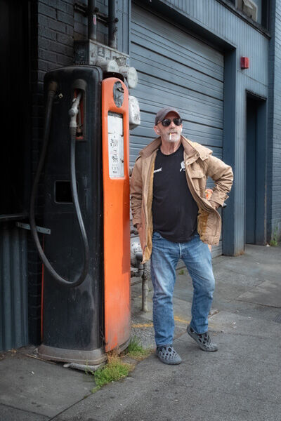The Drinker Having a Smoke